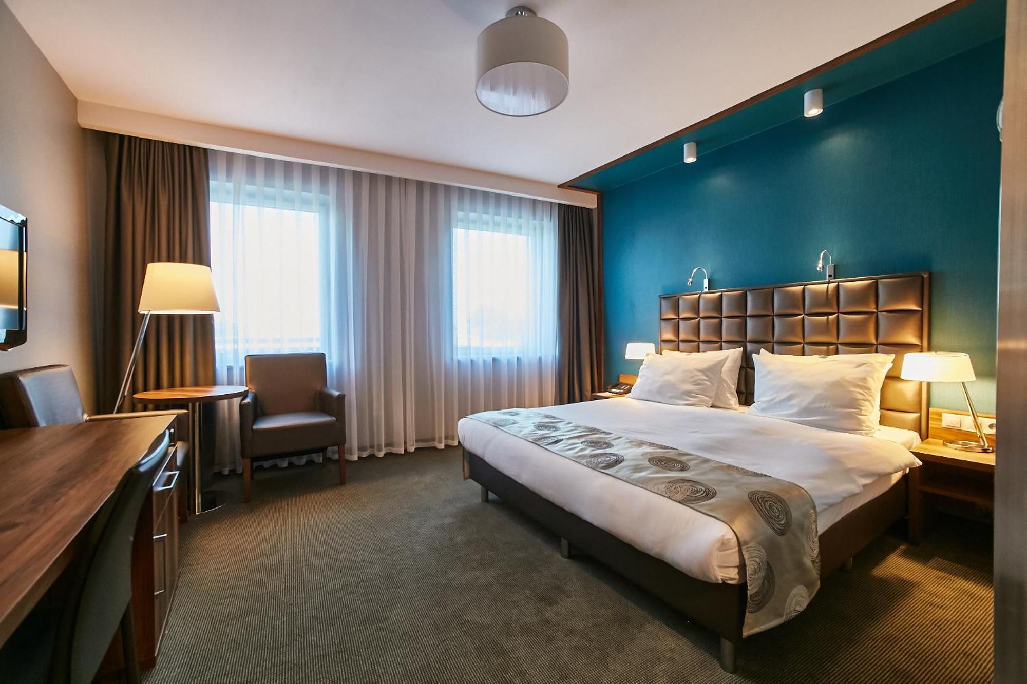 Holiday Inn Krakow City Centre By Ihg Bagian luar foto A room at the Radisson Blu Hamburg